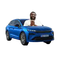 a man is kneeling on top of a blue car with a license plate reading el7 04cl