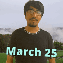 a man wearing glasses and a black shirt says march 25