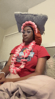 a woman wearing a red shirt that says twin cities on it