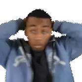 a man wearing a blue sweatshirt with the letter a on it