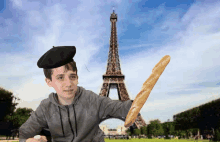 a boy wearing a black beret is holding a baguette in front of the eiffel tower