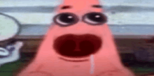 patrick star from spongebob squarepants is making a funny face with his mouth wide open .