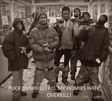 a group of young men posing for a picture with the caption " fuck overkill all my homies hate overkill ! "