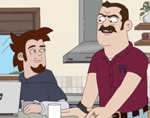 a man with a pen in his pocket stands next to another man in a kitchen