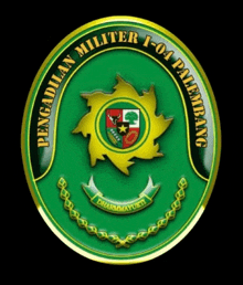 a green and gold coin that says pengadilan militer i- 04 palembang