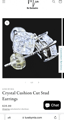 a pair of crystal cushion cut stud earrings are on a website