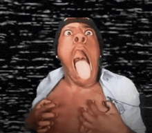 a man making a funny face with his tongue hanging out