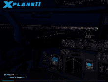 a cockpit of an airplane with xplane11 on the top