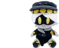 a stuffed animal wearing a hat and a badge that says ci
