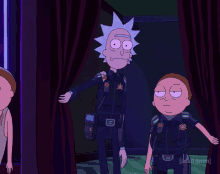 rick and morty standing next to each other in a dark room