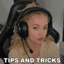 a woman wearing headphones with the words tips and tricks written below her