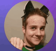 a young man with a choker and cat ears on his head