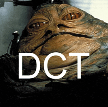 a picture of jabba the hutt with the letters dct above it