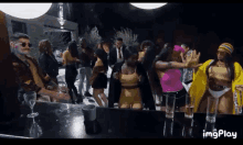 a group of people are dancing at a party with images play written on the bottom