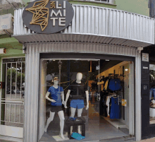 a storefront with a sign that says ' ultimate ' on it