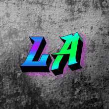 the word la is displayed on a gray wall