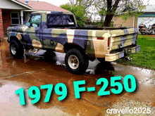 a 1979 f-250 truck is parked in a driveway in front of a house