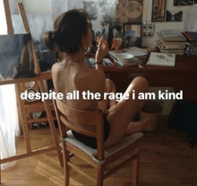 a woman is sitting in a chair with the words despite all the rage i am kind
