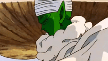a cartoon character with a bandage on his head