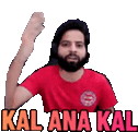 a man with a beard and a red shirt is holding his fist up in the air .