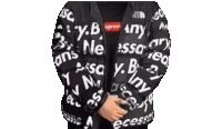 a person is wearing a black jacket with supreme written on it