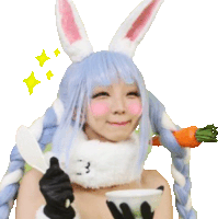 a woman in a bunny costume is holding a carrot and spoon