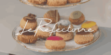 a display of pastries with the words le refletore written on the bottom