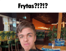 a picture of a boy in a restaurant with the caption frytas ? ! ?