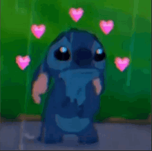 stitch from the disney movie lilo and stitch is surrounded by pink hearts