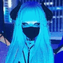 a girl with blue hair and horns is wearing a mask and a choker .