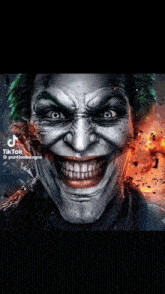 a close up of the face of the joker with a huge smile