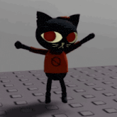 a black cat with red eyes is wearing a red shirt with a circle on it