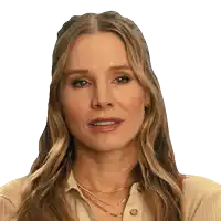 a close up of a woman 's face with a necklace around her neck