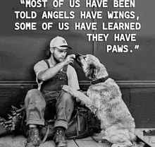 a black and white photo of a man and his dog