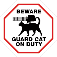 a sign says beware guard cat on duty