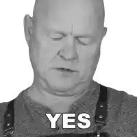 a bald man wearing suspenders says yes