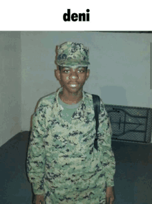 a young man in a military uniform with the name deni on top of him