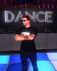 a man stands in front of a sign that says dance