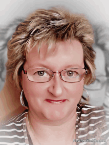 a woman wearing glasses and a striped shirt has a picture of herself on newprofiles.com