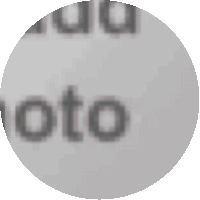 a close up of a circle with the word moto in it