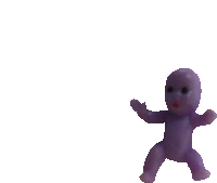 a small purple doll with a red face is standing on a white background