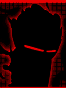 a silhouette of a person 's face with red eyes