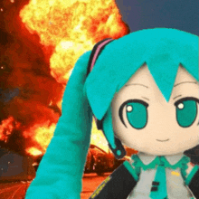 a stuffed toy of hatsune miku is in front of a fire