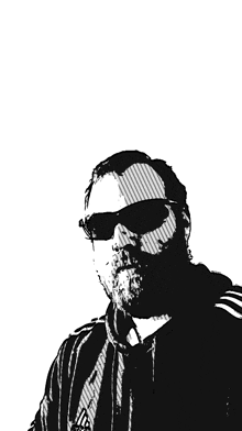 a man with a beard wearing sunglasses and an adidas jacket