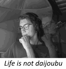 a black and white photo of a person with the words life is not daijoubu