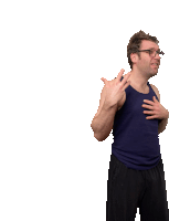 a man wearing glasses and a blue tank top is making a funny face