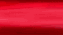 a red background with a black silhouette of a spider