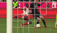 a soccer player wearing a t-mobile vest kicks the ball