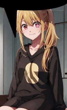 a girl with blonde hair and red eyes is wearing a black shirt