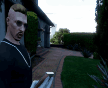 a man wearing sunglasses and a chain around his neck is standing in front of a house